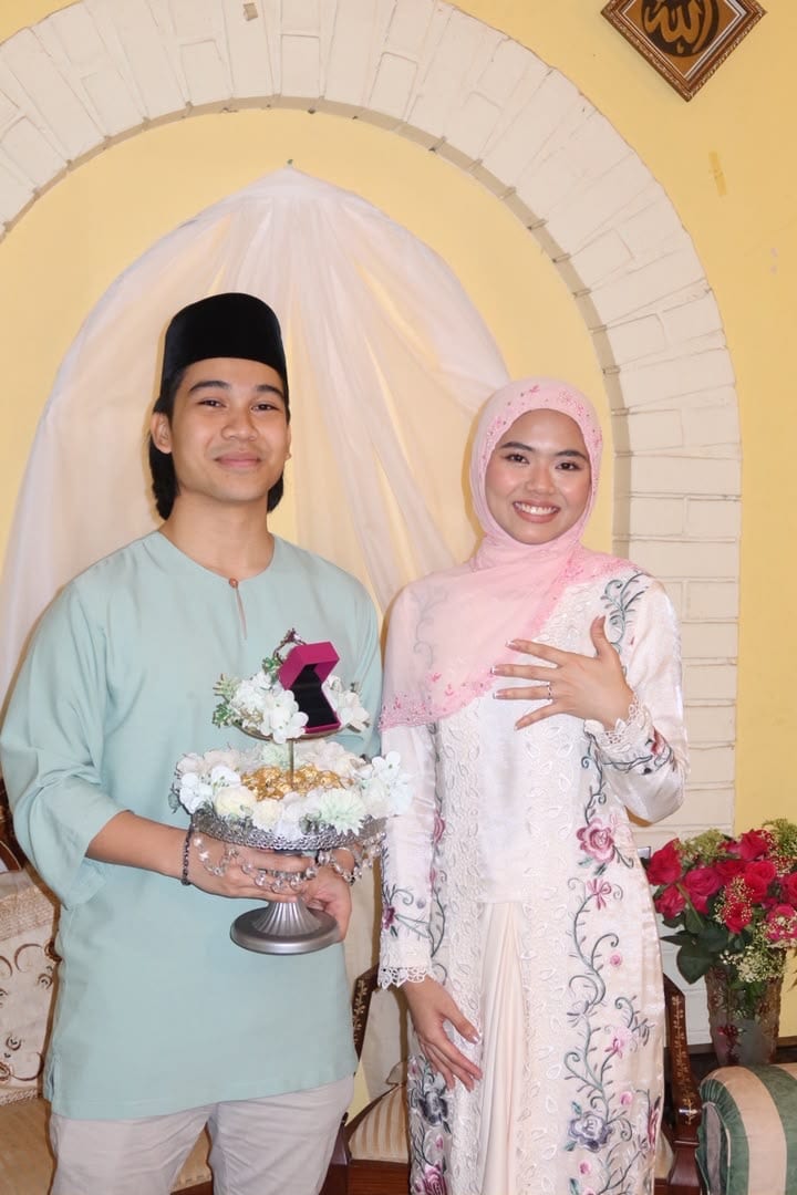 Mia and Arief with the ring tray